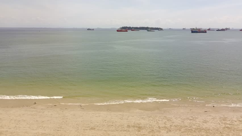 Aerial Drone View of Tropical Beach and Ocean Waves in Malaysia