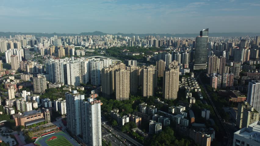 Aerial view of the Central Business District (CBD) and modern skyscraper skyline. Urban architecture and high-rise office buildings in Chongqing, China.