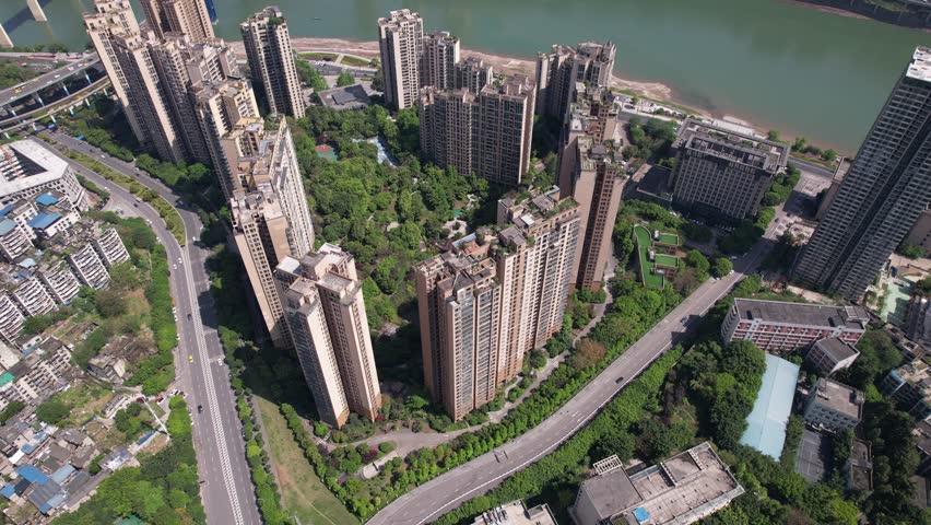 Aerial view of the Central Business District (CBD) and modern skyscraper skyline. Urban architecture and high-rise office buildings in Chongqing, China.