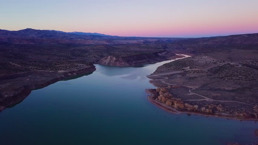 Mountains and Lake with colorful  at golden hour, Indian Reservation, Cochiti Lake, New Mexico Southwest, Drone Aerial, 4K