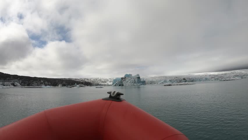  Boat trip cruise among melting icebergs as result of global warming. Jokulsarlon, Iceland