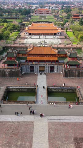 Aerial view of the Imperial City in Hue, Vietnam, showcasing historic architecture, city gates, moats, and surrounding greenery, reflecting cultural heritage and everyday life in central Vietnam.