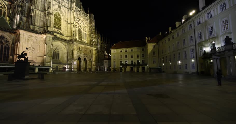 Prague St. Vitus Cathedral gothic church building detailed view at night illuminated in the dark, no people, nobody around in the old town castle area