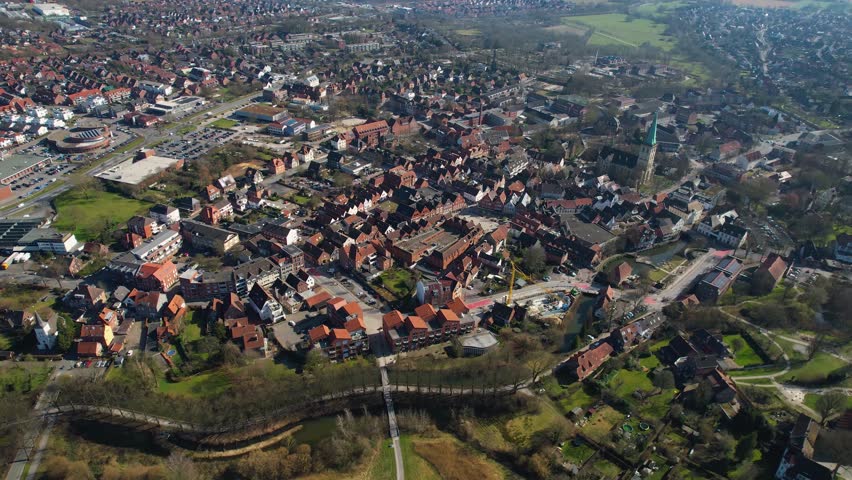 Aerial view around the old town of the city Lüdinghausen on a cloudy spring afternoon in Germany.