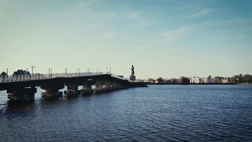 Scenic View of Bridge with Lakeside Landmark.