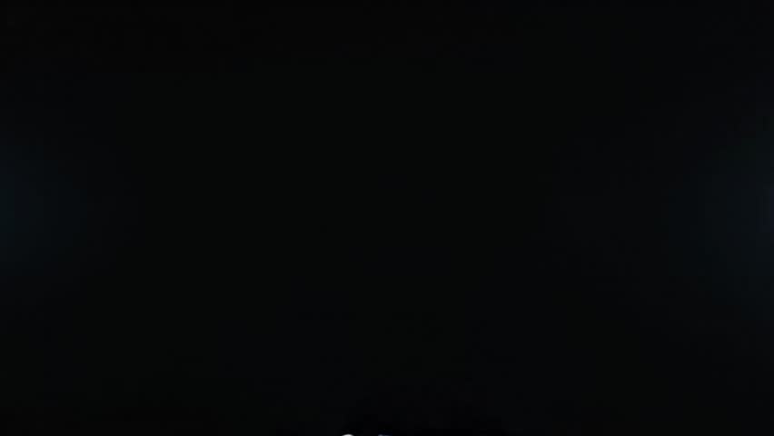 Wispy white smoke plumes rise and swirl against a stark black background creating ethereal abstract organic shapes and atmospheric texture visual.