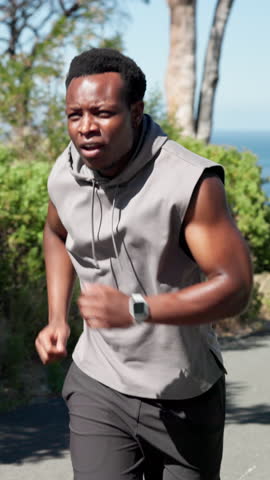 Runner, check time and black man with fitness, smile and cardio workout with challenge. Wellness, athlete or African person in street, exercise or smart watch to track progress. endurance or training