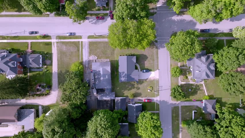 Neighborhood homes in Newaygo, Michigan with drone video overhead.