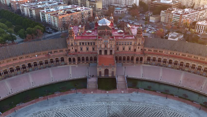 Seville Plaza de Espana at sunset, drone shot, aerial view of historic square in Seville, travel in Andalusia, Spain, Maria Luisa park in Seville