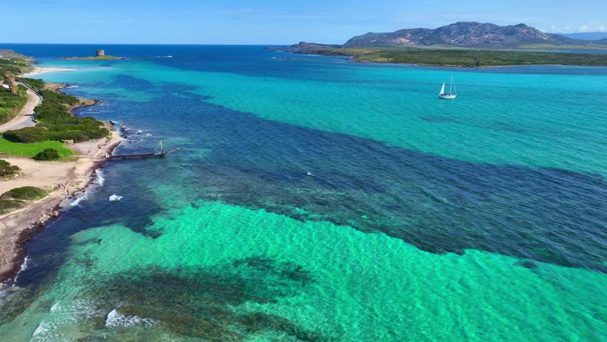 coastline of Sardinia, drone shot of Punta Palau in Sardinia, turquoise waters and white sandy beach, scenic seaside of Sardinia, travel in the Mediterranean