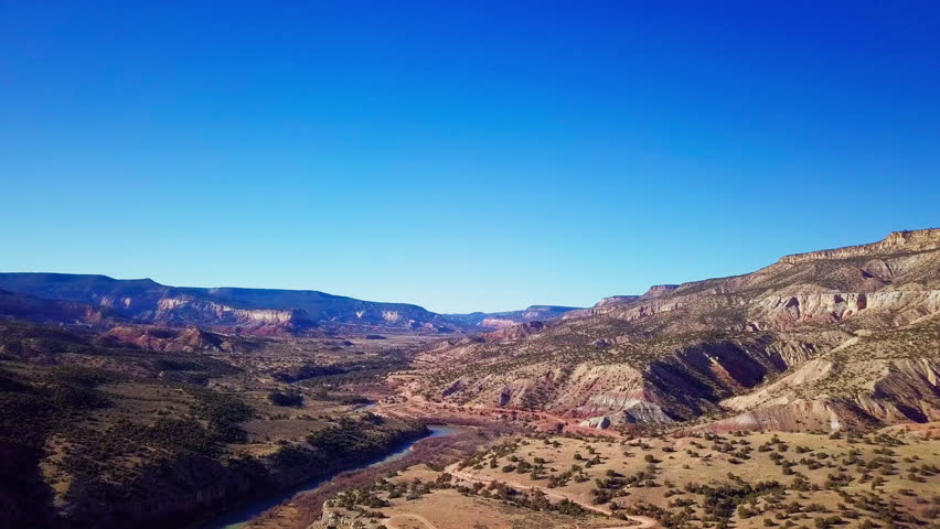4K Drone Aerial, Abiquiu New Mexico, Chama River, desert landscape, southwest national park beauty, Deep Blue Sky Panorama