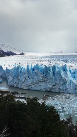 Perito Moreno Glacier At El Calafate In Santa Cruz Argentina. Stunning Landscape. Los Glaciares National Park. Iceberg Background. Perito Moreno Glacier At El Calafate In Santa Cruz Argentina.