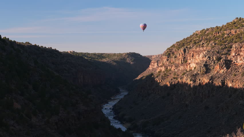 Hot Air Balloon over Rio Grande Canyon, Shadows and Light, Slow Motion, Taos New Mexico, American Southwest, 4K