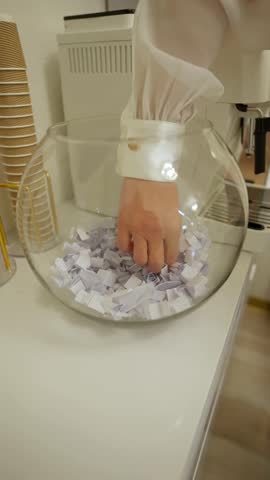 Man takes out a lottery ticket for winning. Concept of winning the lottery.