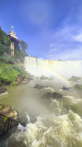 
State of Paraná, Brazil - March 22, 2025: Iguazu Falls are one of the Seven Natural Wonders of the World, located in the Iguazu National Park, on the border of Argentina and Brazil. 
