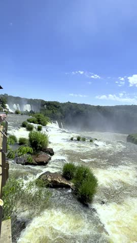 Misiones Province, Argentina - March 27, 2025: Iguazu Falls is one of the Seven Natural Wonders of the World, located in Iguazu National Park, on the border of Argentina and Brazil.