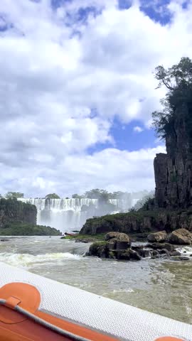 State of Paraná, Brazil - March 22, 2025: Iguazu Falls are one of the Seven Natural Wonders of the World, located in the Iguazu National Park, on the border of Argentina and Brazil. 

