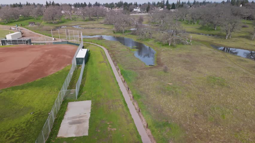 Park with baseball diamonds, oak trees, and vernal pools.