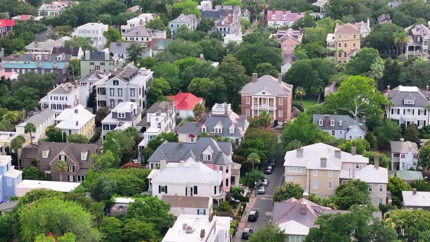Aerial view of downtown Charleston, South Carolina landscapes with historic homes and neighborhoods in the lowcountry on Atlantic coast - 4K Drone