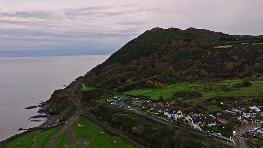 Aerial View of Bray Head Mountain Overlooking Coastal Town and Sea