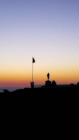 Vertical Video of Turkish Flag Waving at Sunrise with Atatürk Statue on Kocatepe