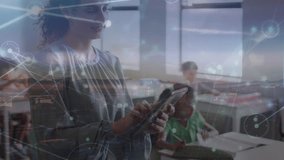 Animation of network of connections over teacher with diverse schoolchildren in classroom. Global education and digital interface concept digitally generated video. - Powered by Shutterstock - Get 15% off with code: PIKWIZARD15