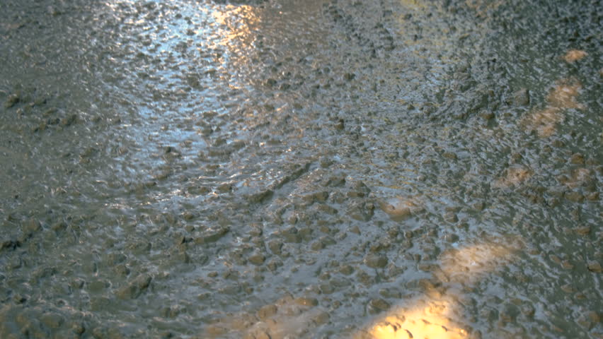 Making concrete screed outdoors. Selective focus. street.