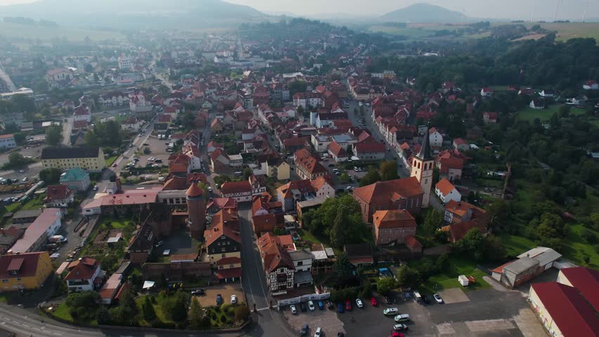 Aerial view around the old town of the city Vacha in Germany on a sunny spring day	
