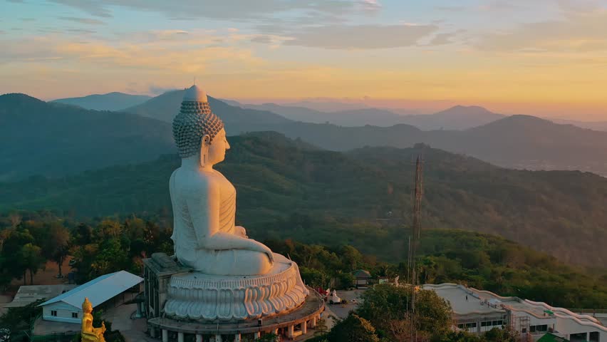 Amazing sweet sky in sunset at Phuket big Buddha. The beauty of the statue fits perfectly with the charming nature. amazing pink sky in sweet sunset at Phuket big Buddha.