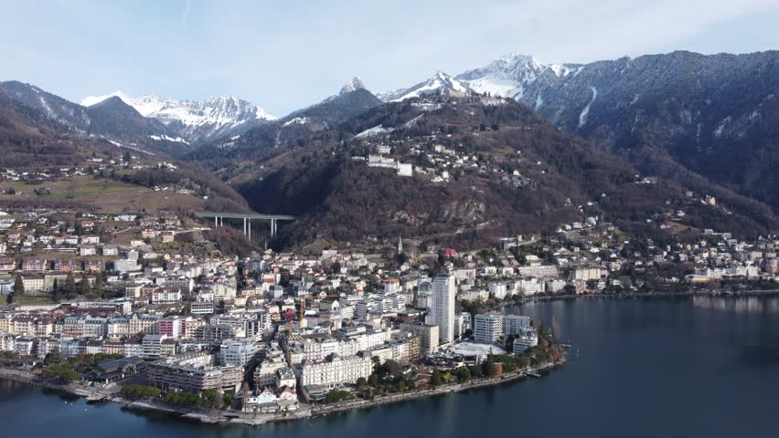 Panoramic aerial footage of Montreux and Lake Geneva