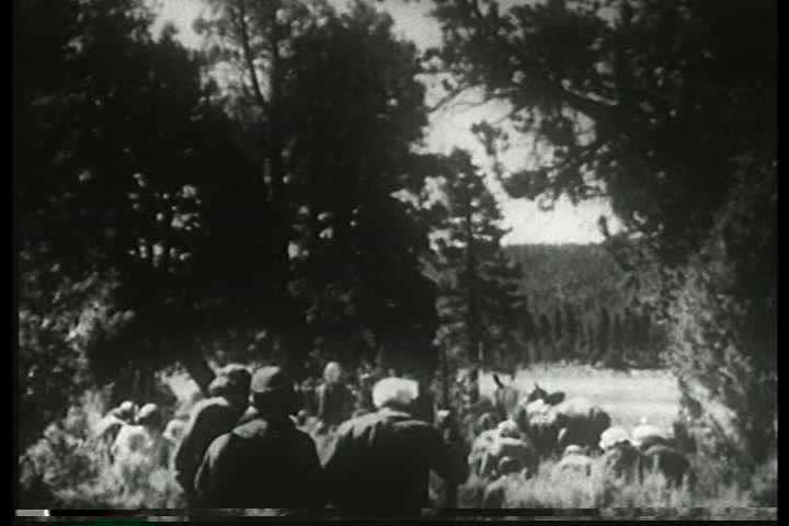 1950s - American speculators move Westward in the 1780s led by Daniel Boone in this historical reenactment.