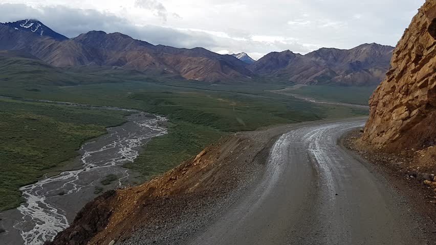View of driving scenic road in Denali National park with view of Denali mountain 