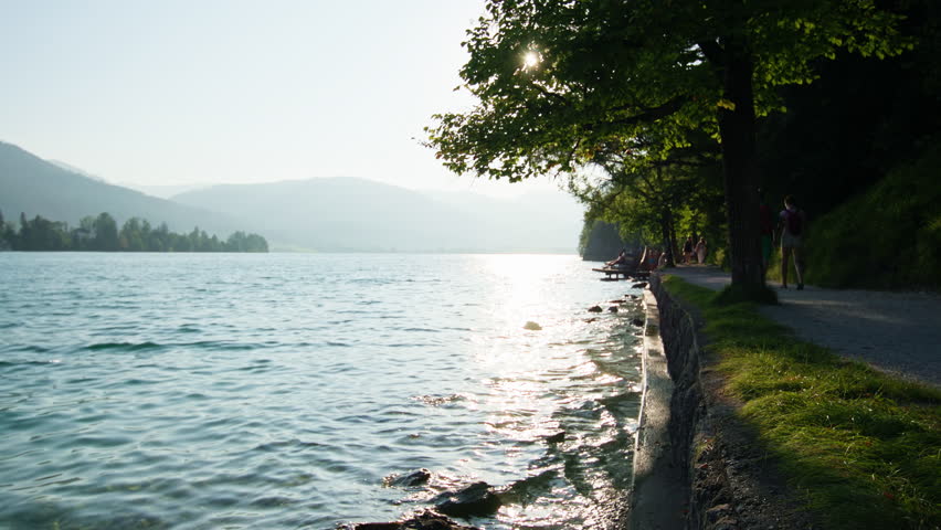Beautiful alpine landscape of lake Wolfgangsee Austria with calm water mountain scenery and iconic tourist place in Europe