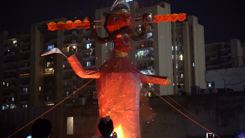 Ravana, Raavan effigy being burnt on the hindu festival of Dussehra symbolizing the victory of good over evil on the run up to Diwali, popular public event at night