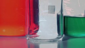 Animation of dna strand and data processing over beakers with liquid. global science, data processing and digital interface concept digitally generated video. - Powered by Shutterstock - Get 15% off with code: PIKWIZARD15