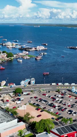 Downtown Manaus Brazil. Capital city of Amazonas State near Amazon river and Amazon forest. Tropical destination. Tropical travel. Tourism landmark. Outdoors urban scenery downtown Manaus Brazil.