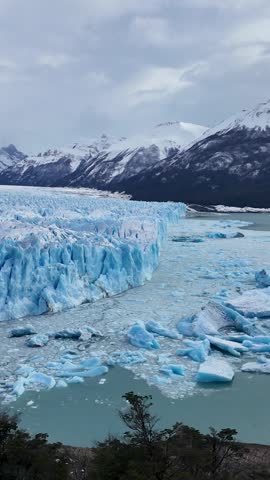 Perito Moreno Glacial At El Calafate In Santa Cruz Argentina. Stunning Glacier. Los Glaciares National Park. Iceberg Background. Perito Moreno Glacial At El Calafate In Santa Cruz Argentina.