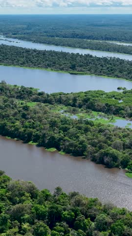Pannning wide landscape of Amazon River at Amazon Forest in 5K resolution. Brazilian amazonian jungle. Manaus Amazonas. Manaus Brazil. Tourism landmark of city. Amazon Region.