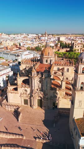 Aerial view of Jerez de la Frontera town in Andalusia, Spain. Jerez Cathedral and historic Moorish Alcazar de Jerez de la Frontera at sunset in Andalucia