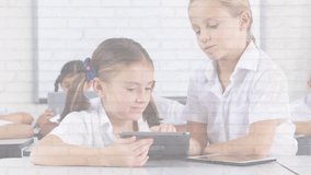 Animation of mathematical equations over schoolchildren using laptop. Global business digital interface and technology concept digitally generated video. - Powered by Shutterstock - Get 15% off with code: PIKWIZARD15