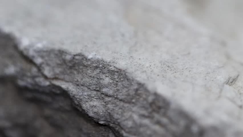 Rock with angular lines, natural stone texture. Macro. Close-up.