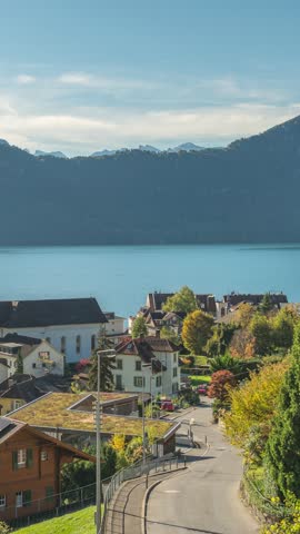Weggis Switzerland time lapse city skyline at Weggis town and Lake Lucerne (Luzern) in Autumn season (vertical)