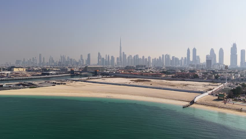 Aerial view of Jumeirah Beach with Dubai skyline in the background, UAE