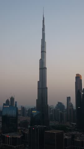Vertical time lapse of downtown Dubai with Burj Khalifa after sunset, UAE