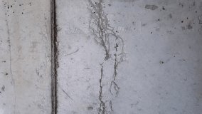 Close-up video unveils cracks in a poor quality concrete wall. - Powered by Shutterstock - Get 15% off with code: PIKWIZARD15