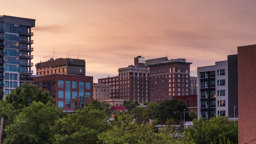 Greenville, South Carolina, USA downtown city skyline at dusk.