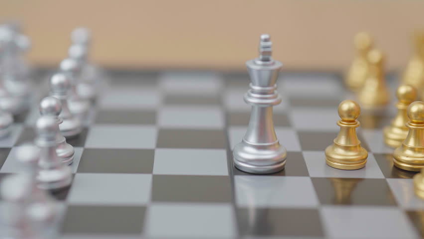 hand moving gold Chess Pawn figure and Checkmate opponent during chessboard competition. Strategy, Success, management, business planning, win, disruption, Trade war and leadership concept