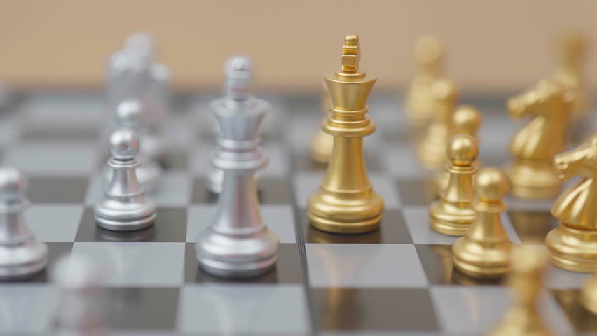 hand moving gold Chess King figure and Checkmate opponent during chessboard competition. Strategy, Success, management, business planning, win, disruption, Trade war and leadership concept