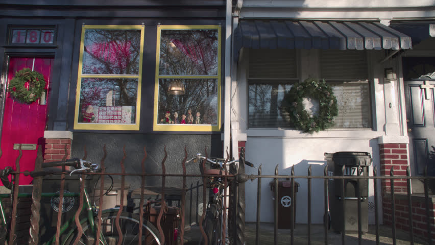 Handheld shot of a house in Greenpoint, Brooklyn. Shot on a winter day during the Christmas season in New York City.