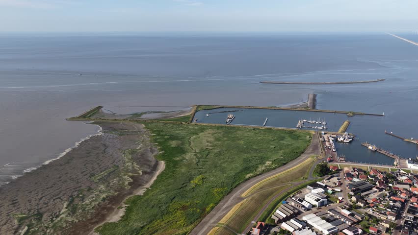 Aerial view of dutch harbor town and north sea coastline